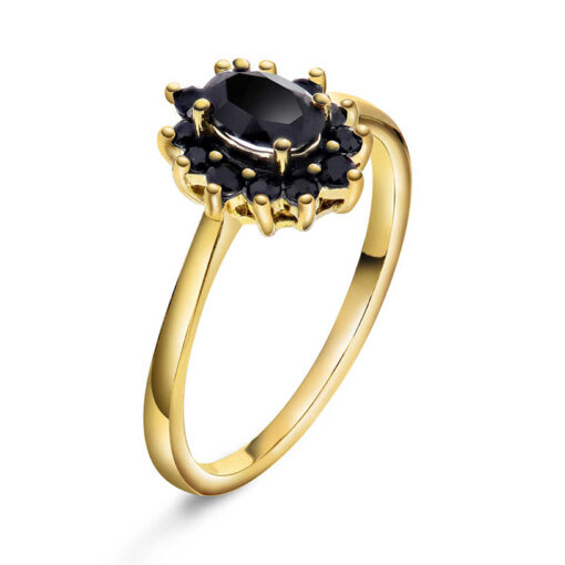 Ring i gull med sort safir